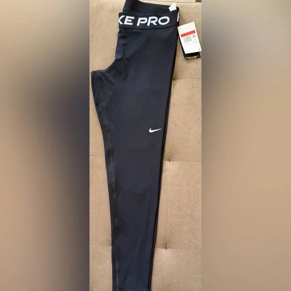 NWT- Nike Pro Mid-Rise Mesh-
Paneled Leggings - Picture 2 of 11